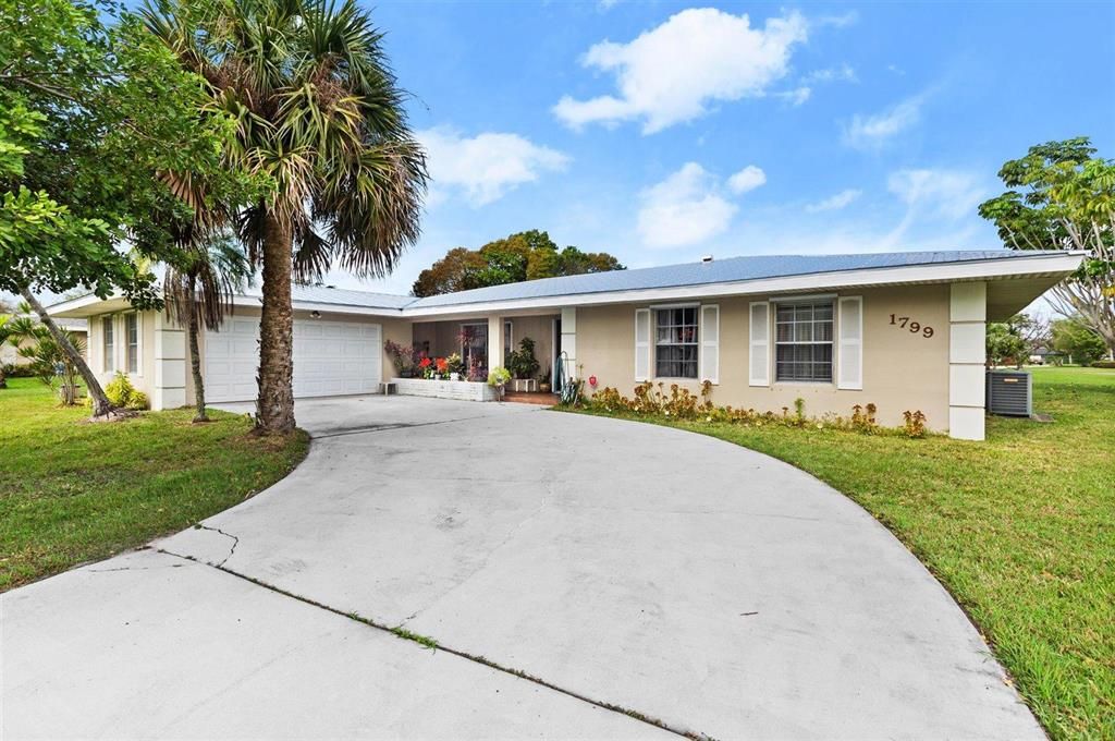 Photo of 1799 SE Westmoreland Boulevard, Port Saint Lucie, FL 34952 (MLS # R10647221)