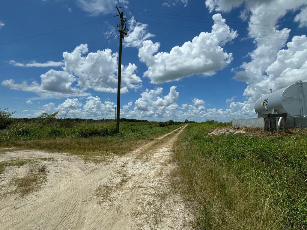 Photo of 28160 ORANGE Avenue, Fort Pierce, FL 34945 (MLS # B26080382)