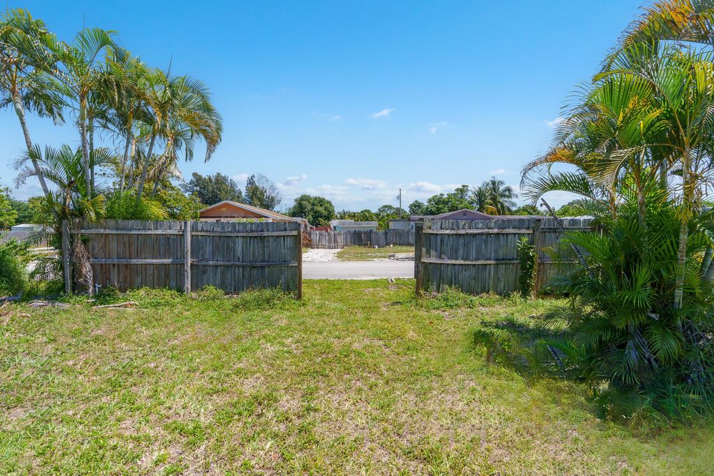 Photo of 661 Neptune Street, West Palm Beach, FL 33406 (MLS # R10976196)