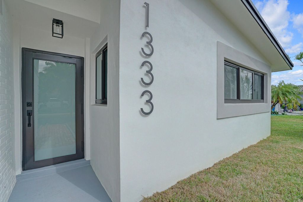 Photo of 1333 SE 8th Street, Deerfield Beach, FL 33441 (MLS # R11166532)