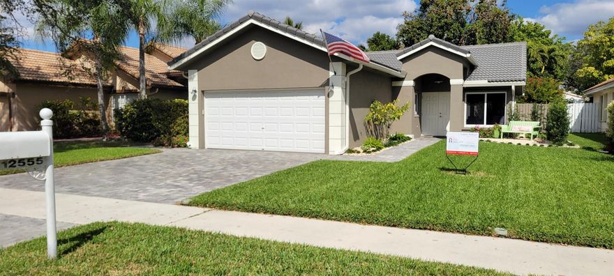 Dream home in Davie’s highly sought-after Arboretum community, a peaceful, family-friendly neighborhood. This beautifully maintained 3bed 2bath residence offers an open floor plan with split-bedroom layout. The spacious living area features vaulted ceilings, knockdown texture, and French doors allowing natural light. The chef’s kitchen shines with stainless steel appliances including a double convection oven, granite countertops, custom cabinetry, and a premium water filtration system. The oversized master suite is a true retreat, complete with an updated bath featuring a Toto electric toilet and relaxing Roman tub overlooking the manicured backyard. Hurricane-rated windows and doors, rain jet shower in the second bath, and a lush, private backyard oasis. Short walk to top-rated schools.