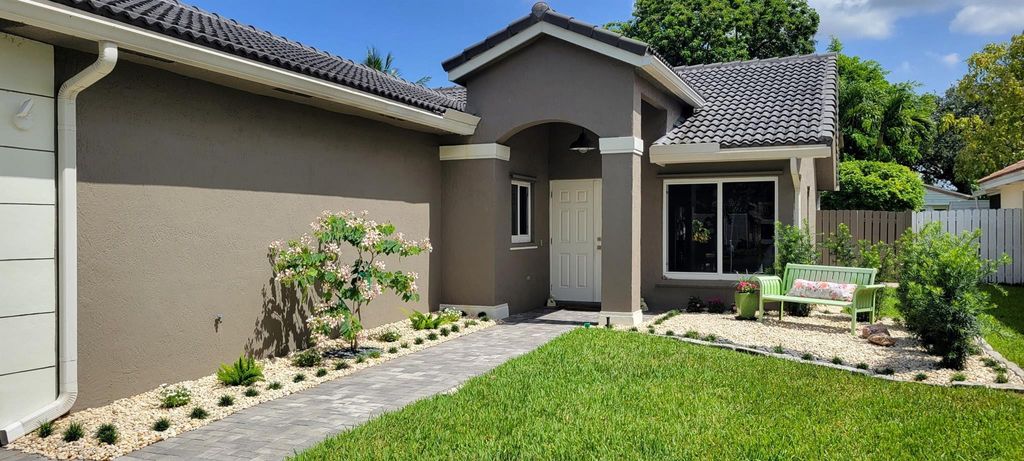 Photo of 12555 SW 7th Place, Davie, FL 33325 (MLS # F10551041)