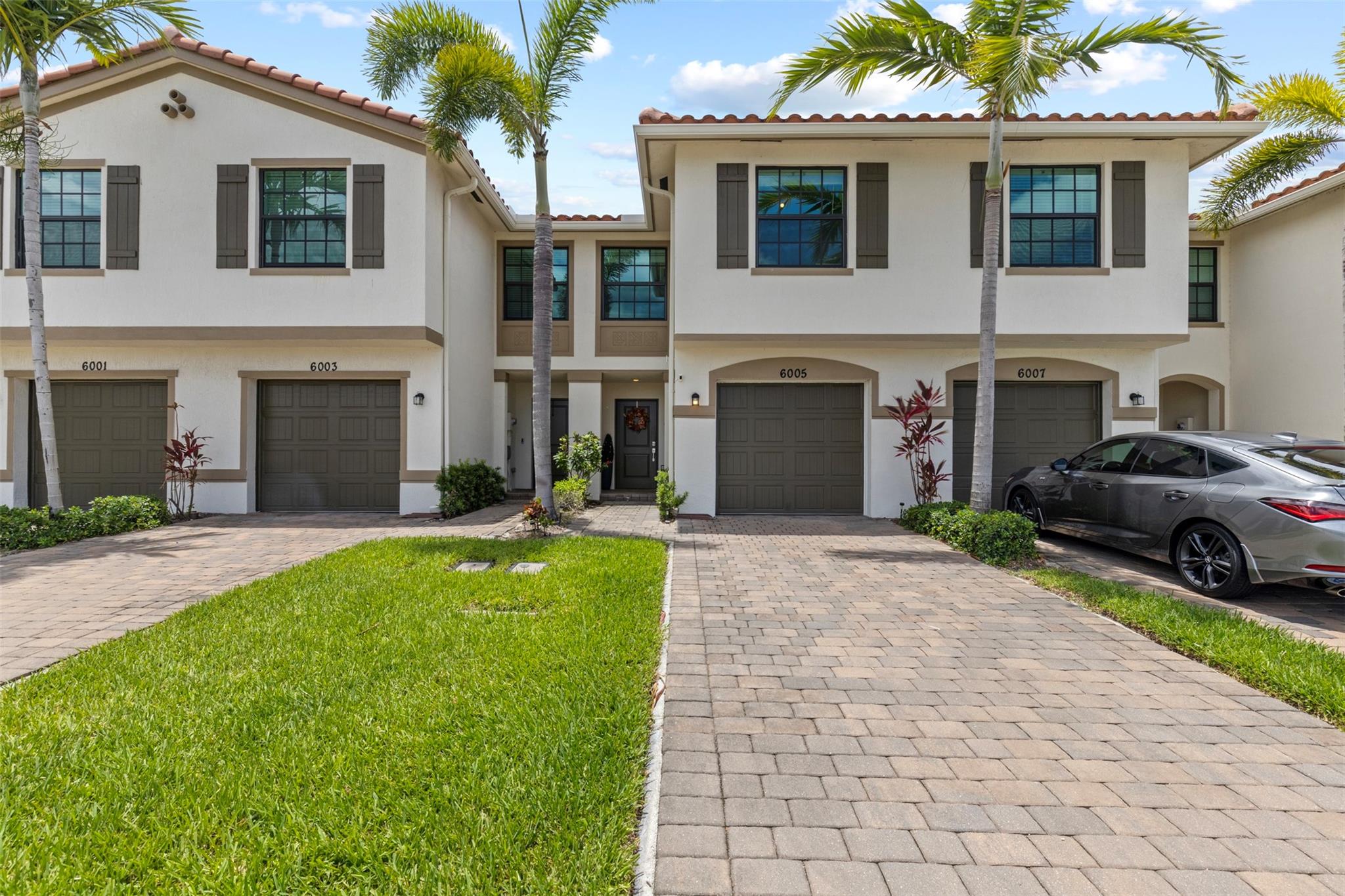 Modern Luxury | Built 2022 | Gated Community | Priced to Sell
Experience low-maintenance living in this stylish 3BR/2.5BA townhouse in Arbor Parc. Built in 2022, this move-in-ready home offers an open floor plan, high ceilings, impact windows, and natural light throughout. The upgraded kitchen boasts quartz-style counters, stainless appliances, a large island, and walk-in pantry. Upstairs, the spacious primary suite includes dual vanities and a glass-enclosed shower. Enjoy a full-size laundry room, ample storage, and a private extended patio. One-car garage + 2-car driveway. Gated, well-kept community with low HOA. Close to I-95, downtown, shopping, beaches, and airports.