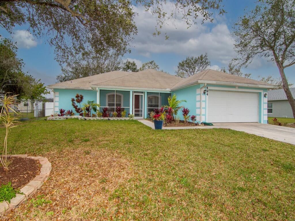 Photo of 594 SW Ester Avenue Ave, Port St Lucie, FL 34983 (MLS # R10778015)
