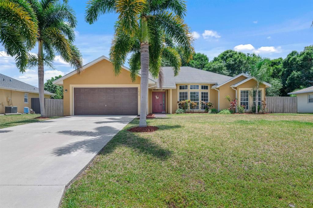Photo of 1658 SW Janette Avenue, Port Saint Lucie, FL 34953 (MLS # R10799638)