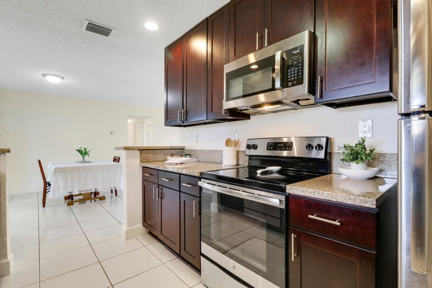 Move-in ready and fully hurricane protected with impact shutters and doors (2019). This well-maintained home features a privacy fence (2020), NEW PVC plumbing (2018), and conversion from septic to city sewer (2018). The primary bath was fully remodeled with new shower, walls, and flooring (2019). Guest bedrooms and bath feature ceramic tile upgrades (2019). Recent improvements include a new water heater (2018), washer (2021), upgraded lanai flooring, and new wood fascia (2018). AC serviced twice yearly with added UV light system (2018-2025). Fresh interior paint throughout main living areas and primary suite (2026). Roof (2017)Spacious garage and large backyard complete this turnkey home.