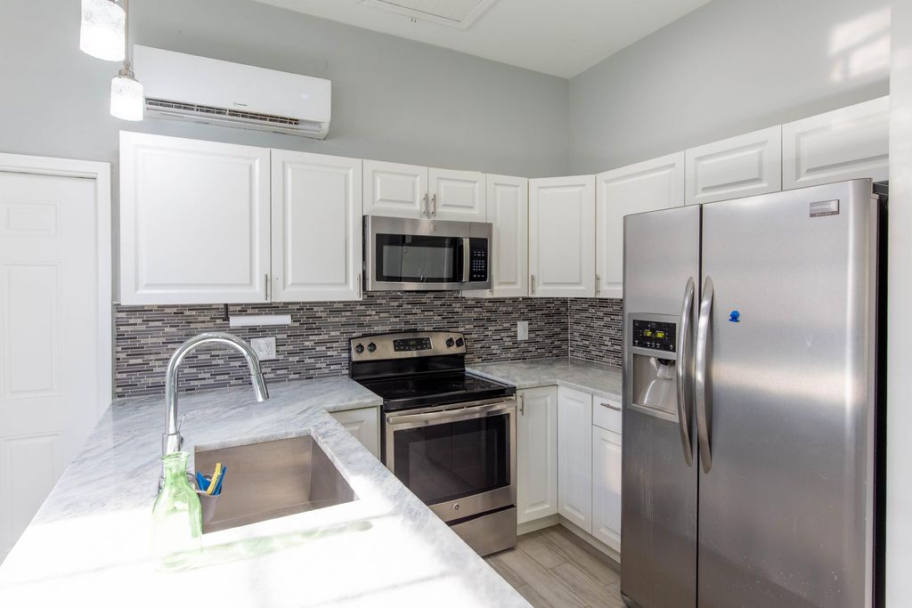 Photo of 13428 N 87th St Street N #Guest House, The Acreage, FL 33412 (MLS # B26017748)