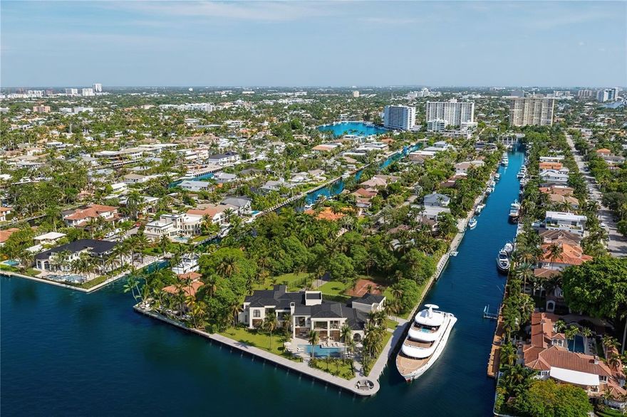 Nestled in the prestigious Las Olas Isles, this 1.2-acre trophy point lot is among the last of its kind in Fort Lauderdale. Once owned by the Anheuser-Busch family, this iconic estate boasts over 520 feet of water frontage in a coveted no-wake zone, ideal for mega-yacht dockage with sweeping Intracoastal views from every angle. A rare canvas for visionaries, this iconic property invites the creation of a one-of-a-kind world-class residence with resort amenities, multi-car garage, and even a guest house. Just minutes from the 17th Street Causeway and the ocean beyond, it offers a rare convergence of history, scale, and location—an extraordinary opportunity to craft a true legacy estate awaits. Property can be subdivided into 2 or potentially 3 lots, call for more information.