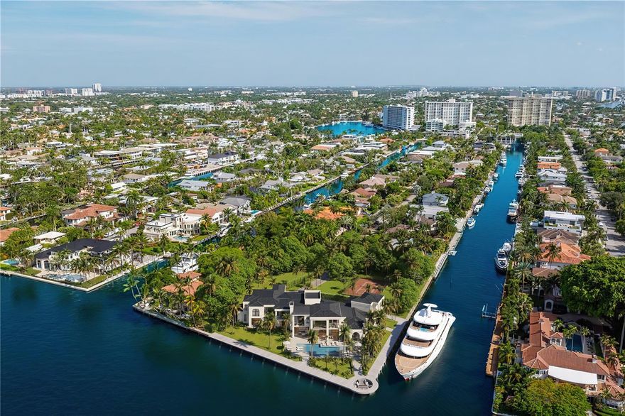Nestled in the prestigious Las Olas Isles, this 1.2-acre trophy point lot is among the last of its kind in Fort Lauderdale. Once owned by the Anheuser-Busch family, this iconic estate boasts over 520 feet of water frontage in a coveted no-wake zone, ideal for mega-yacht dockage with sweeping Intracoastal views from every angle. A rare canvas for visionaries, this iconic property invites the creation of a one-of-a-kind world-class residence with resort amenities, multi-car garage, and even a guest house. Just minutes from the 17th Street Causeway and the ocean beyond, it offers a rare convergence of history, scale, and location—an extraordinary opportunity to craft a true legacy estate awaits. Property can be subdivided into 2 or potentially 3 lots, call for more information.
