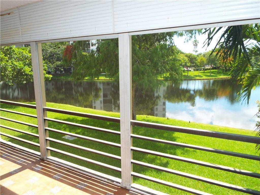 Photo of 2311 S Cypress Bend Drive #219A, Pompano Beach, FL 33069 (MLS # F10412204)