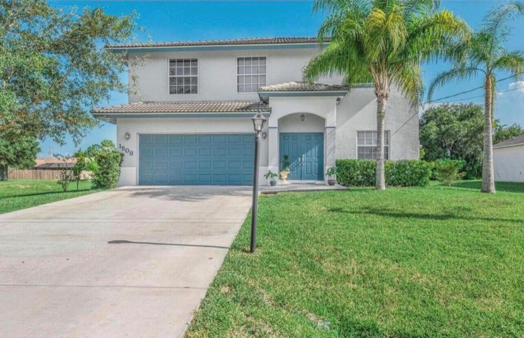 Photo of 1508 SW Hackensack Avenue, Port St Lucie, FL 34953 (MLS # R10916465)