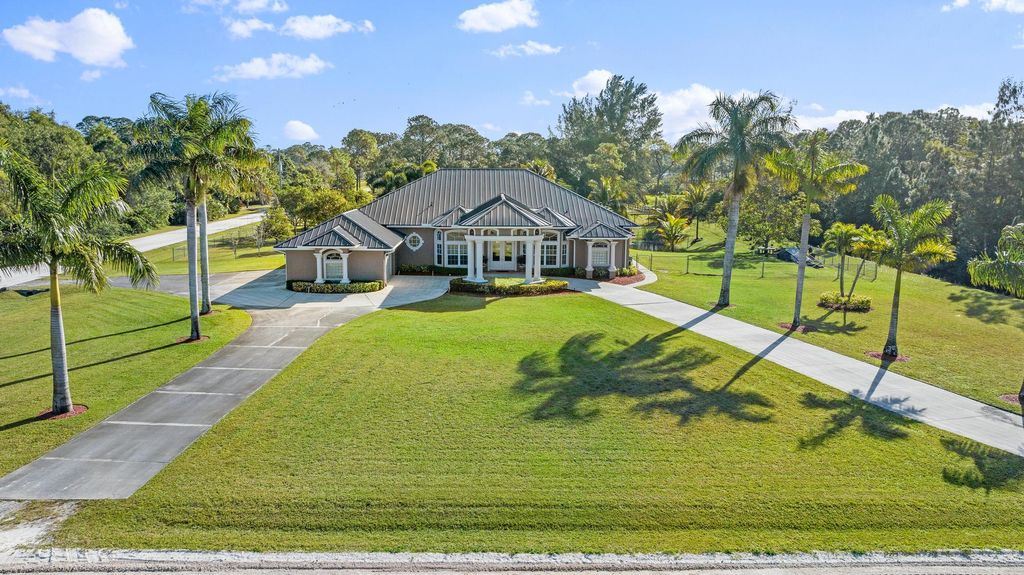 Photo of 7802 130th Avenue N, West Palm Beach, FL 33412 (MLS # R11138844)