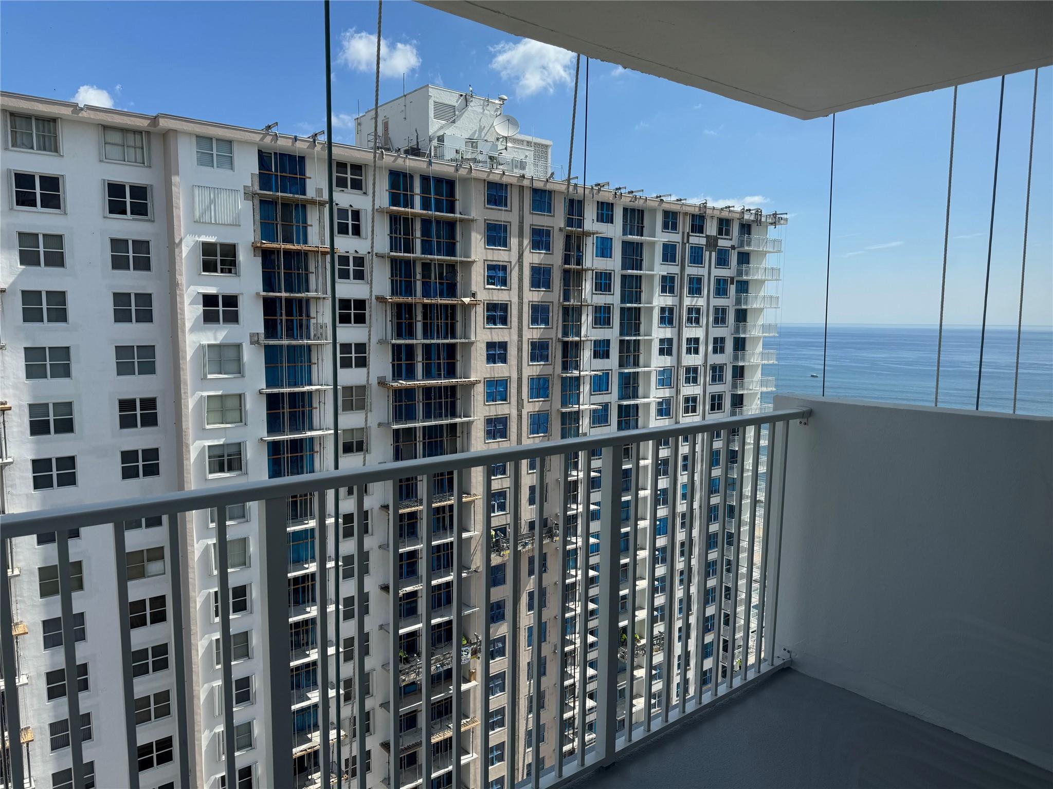 corner unit with 2 bedrooms 2 bath fully furnished. extra 2 windows giving you more view of the city, lights, sunset from kitchen and living room. your balcony looks at the intracoastal, ocean and city... bright and open unit. 24hr security. garage parking. min. 90 days or longer.... king size bed in master bedroom. kitchen & guest bathroom updated. clubhouse on the ocean side with bbq grills, picnic tables, gym, cafe/restaurant, billiard table,... lots of entertainment. walk to the pier...