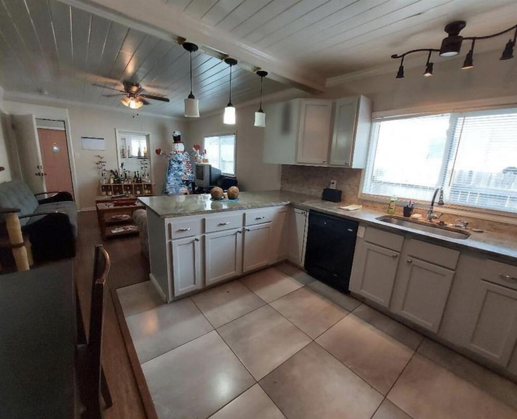 Photo of 1009 18th Street, West Palm Beach, FL 33407 (MLS # B26006735)