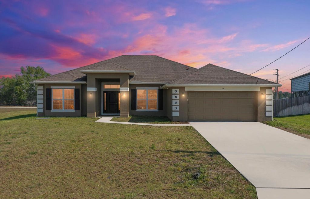 Photo of 5803 NW Dooley Circle, Port Saint Lucie, FL 34953 (MLS # R11166255)