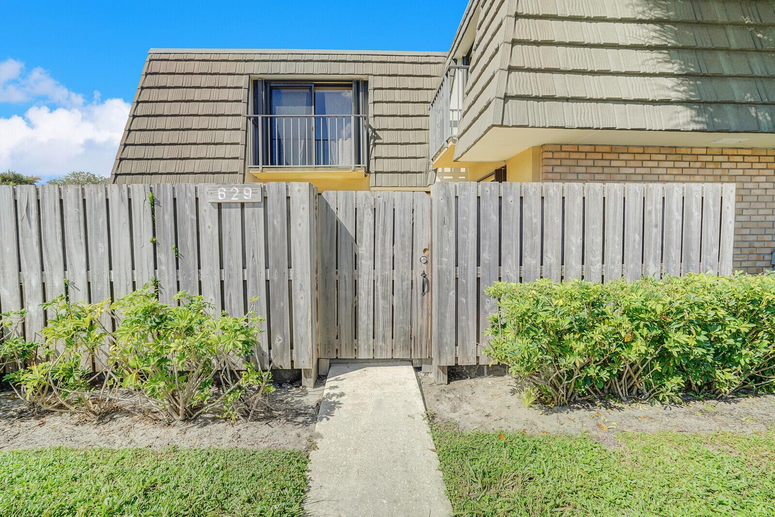 This spacious two-story townhouse featuring 2 bedrooms and 2.5 bathrooms. The open floor plan offers an inviting living area, perfect for relaxing or entertaining. The kitchen boasts ample counter space with eat in countertop.Upstairs, you'll find two generously sized bedrooms and two full bathrooms for added convenience. Additional highlights include a cozy half-bathroom on the main floor, in-unit laundry, and a private patio for outdoor enjoyment. The townhouse is situated in a desirable community, close to schools, shopping centers, and parks, with easy access to public transportation and major highways, with a view of the lake from the upstairs bedroom. This is the perfect place for first-time buyers, downsizers, or anyone looking for a low maintenance