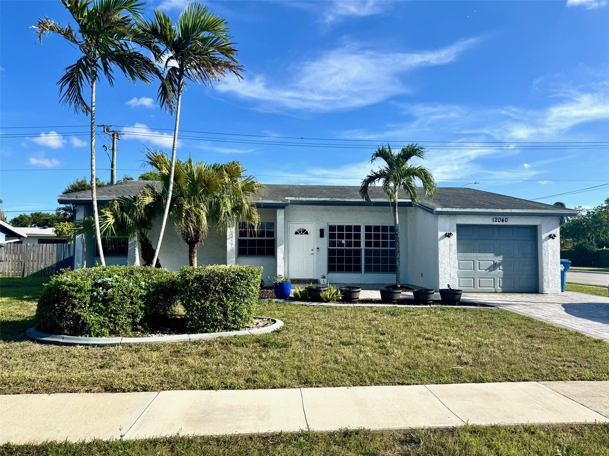 This beautiful, fully renovated home with all that West Sunrise has to offer is a move-in-ready property that features a newer roof and gutters 2021. Impact windows and doors, washer/dryer, electrical panel, outside a/c, kitchen, bathrooms, and flooring 2023. Two parks within walking distance. Welleby Park has a dog park as well as a Splash Pad and SAC Park. Within 5 minutes of Sawgrass Mall and Amerant Bank Arena. Enjoy a spacious backyard that is fenced in with a fantastic pool. The primary source of energy for the home's appliances, such as water heater, range, and dryer is natural gas. Don't miss this wonderful opportunity!