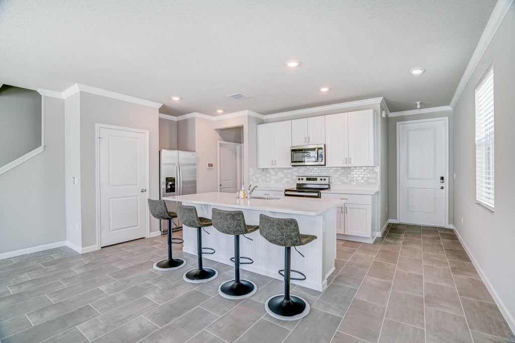 Photo of 187 Osprey Preserve Boulevard, Jensen Beach, FL 34957 (MLS # R10957520)
