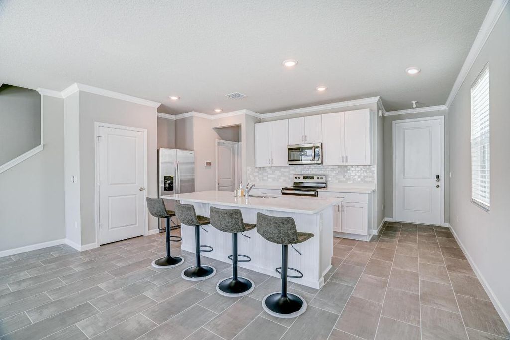 Photo of 187 Osprey Preserve Boulevard, Jensen Beach, FL 34957 (MLS # R10957520)