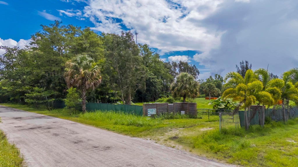 Photo of 6424 Park Lane W, Lake Worth Beach, FL 33449 (MLS # B26070603)