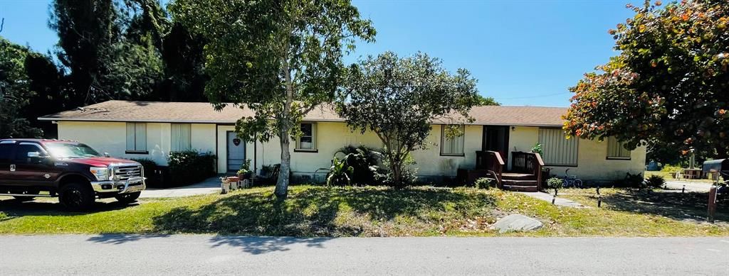 Photo of 1701 Woodward Drive, Fort Pierce, FL 34946 (MLS # R10876507)