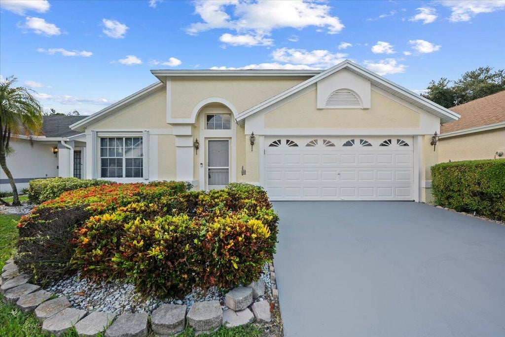 Photo of 149 HAMMOCKS Drive, Greenacres, FL 33413 (MLS # B26056755)
