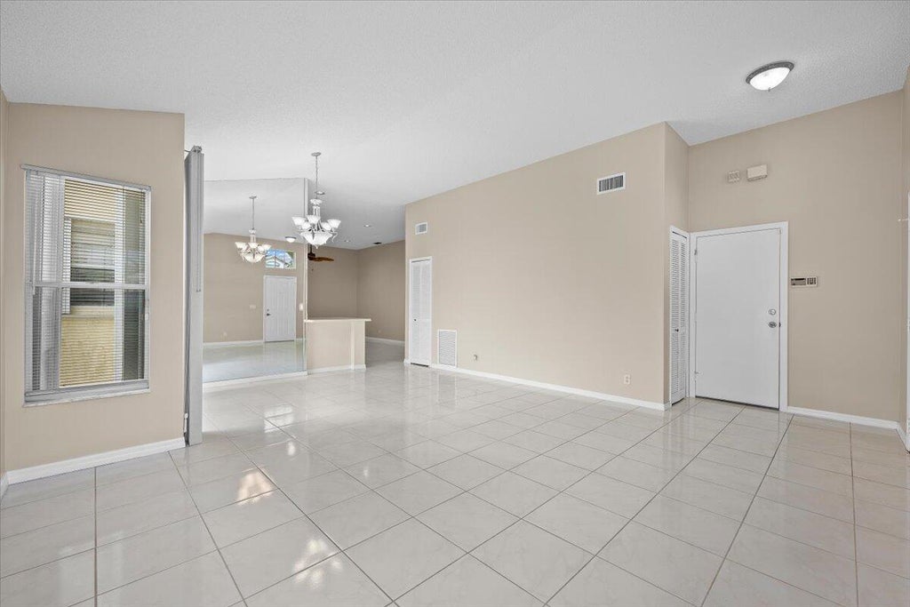 Photo of 149 HAMMOCKS Drive, Greenacres, FL 33413 (MLS # B26056755)