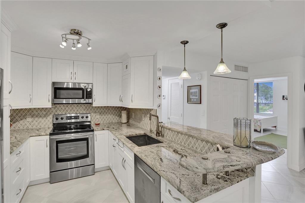 Welcome Home To Your Boutique Condo Oasis. Boca View Offers You The Most Desirable Location 2 Blocks From The Ocean, Steps Away From The Intracoastal & The World Renowned Boca Hotel. NEW OWNERS CAN RENT RIGHT AWAY,Very Spacious Living Room & Bedrooms With Walk In Closets. Same Gorgeous Tiled Floors Throughout. A/C & Water Heater 2016. All Kitchen Samsung Appliances 5 Years Old With Custom Cabinetry. Primary Bedroom is Large Enough For Sitting Area at 12x26 Feet! Assigned Covered Underground Parking Space with Plenty of Guest Parking. Free Laundry, Extra Storage, Library, Fitness Center, Sauna, Clubhouse With Card/Gathering Room Just Off The Pool. Must See To Appreciate!