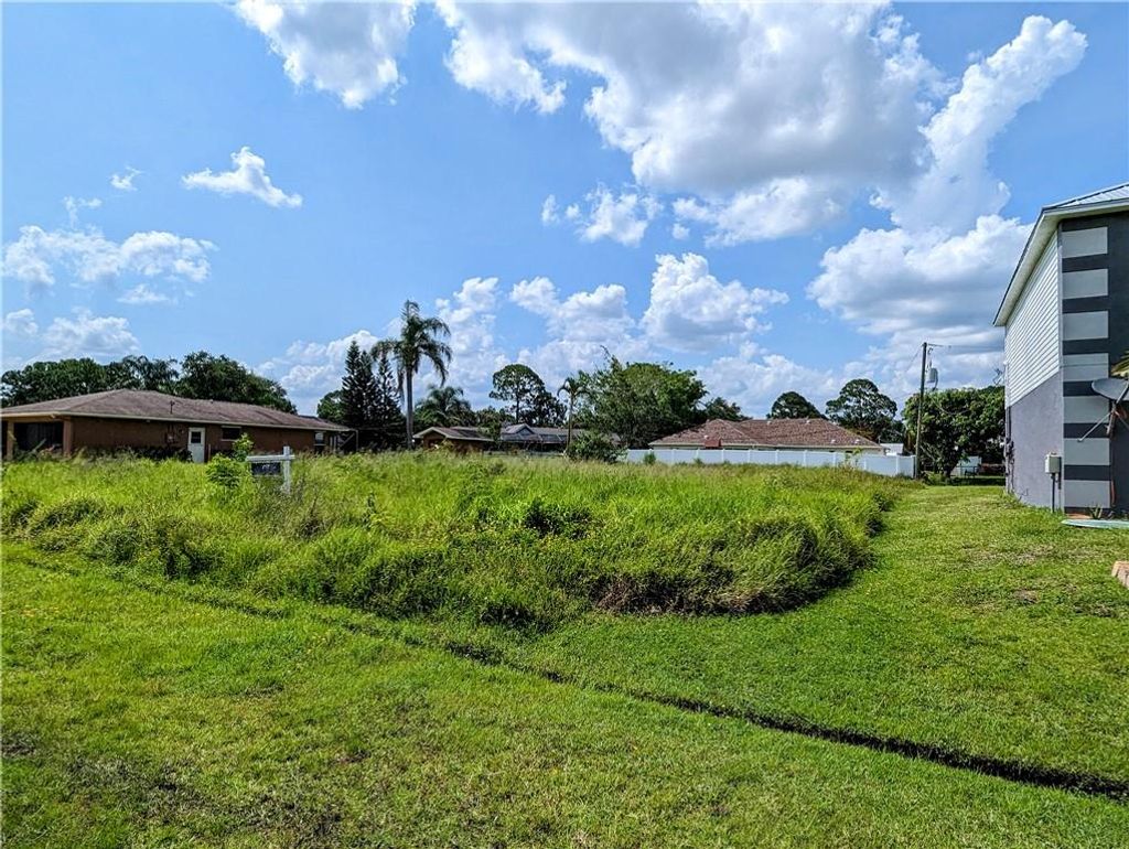 Photo of 295 SW Grove Ave, Port St Lucie, FL 34983 (MLS # F10387575)