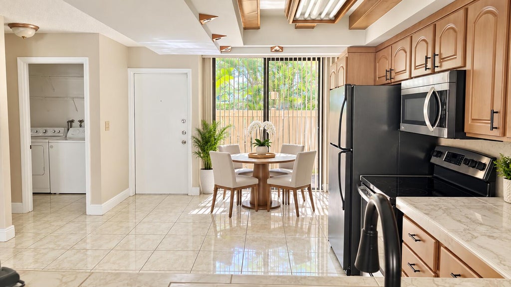 Photo of 8701 SW 30TH Street #205, Davie, FL 33328 (MLS # B26093844)
