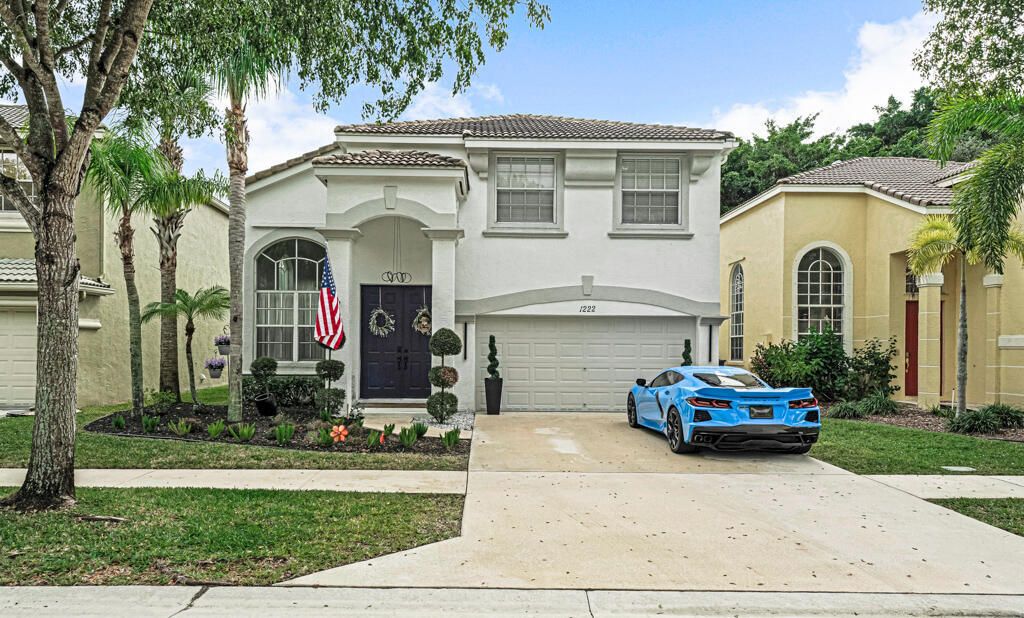 Photo of 1222 Oakwater Drive, Royal Palm Beach, FL 33411 (MLS # B26020990)