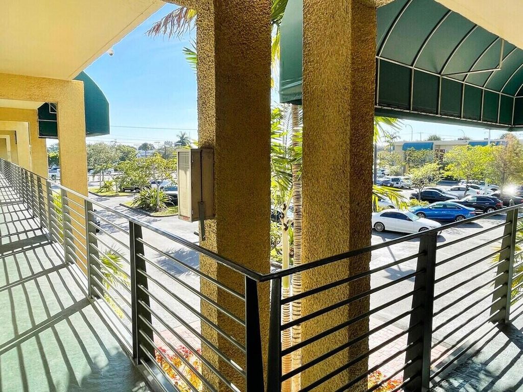 Photo of 2331 N State Rd 7 #203, Lauderhill, FL (MLS # R10960225)