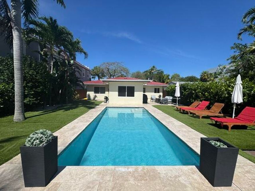 A tropical paradise located on a cul-de-sac street in trendy Tarpon River. Lightly stained laminate wood flooring throughout affords a bright and airy living area. Kitchen updated with hardwood cabinets, stainless steel appliances and granite countertops. Spectacular  pool  surrounded by travertine marble pavers. Travertine marble pavers in driveway. Artificial turf in backyard offers a low maintenance outdoor area to let the kids play or the dogs to run around.  Hurricane impact windows and doors throughout. Tarpon River is exploding with new residential high rises along the river offering more restaurant options. Only a 10 minute walk to existing restaurants and hotspots!