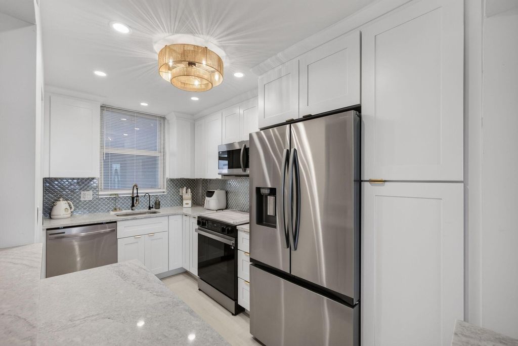 Photo of 100 Paradise Harbour Boulevard #307, North Palm Beach, FL 33408 (MLS # B26026420)