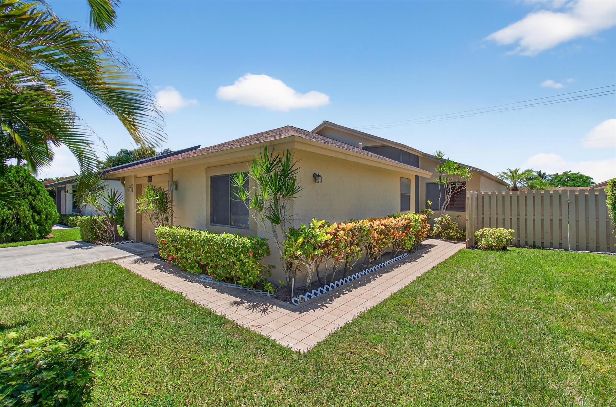 Beautiful 2 bedroom, 2 bathroom, single family home in a gated 55+ community with resort-style amenities. Enjoy a bright, open layout, Florida room, one car garage, and spacious living areas. Rainberry Bay offers pools, tennis, pickle ball, fitness center, clubhouse, and a 600 seat theater- all just minutes from the beach an vibrant downtown Delray. Incredible value and lifestyle in one!