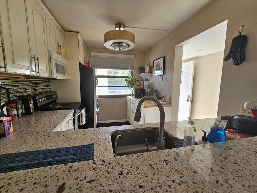 Photo of 6085 S Balboa Cir #303, Boca Raton, FL 33433 (MLS # F10540034)