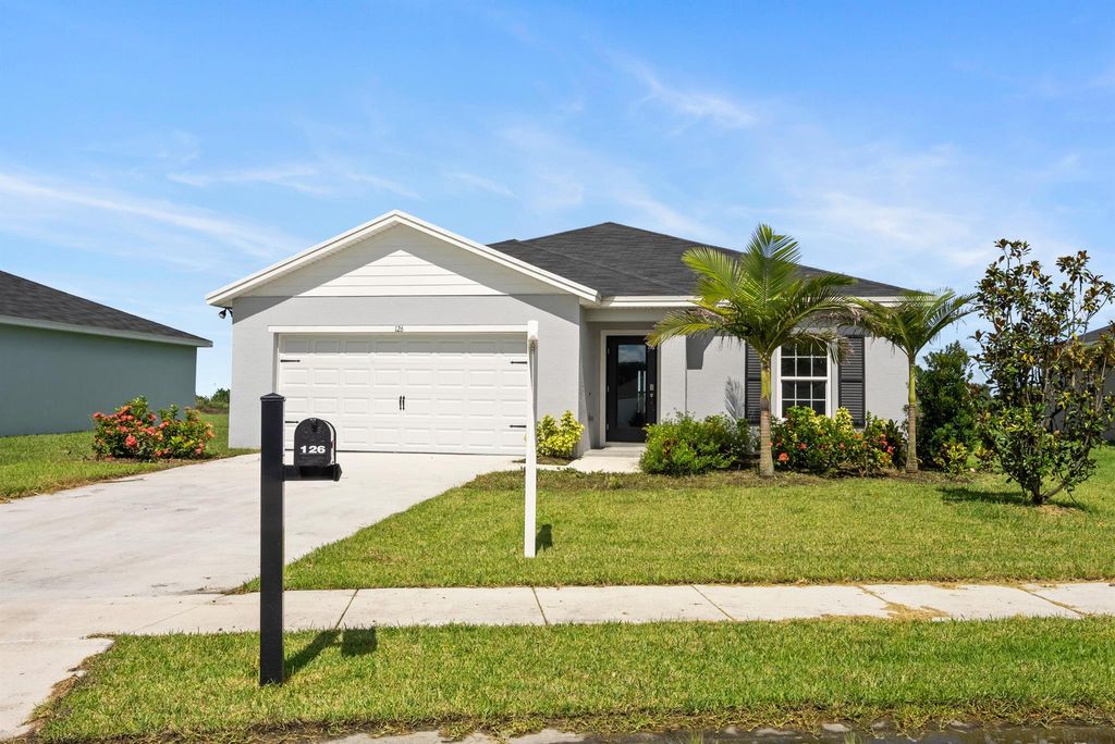 Photo of 126 Dabou Loop, Belle Glade, FL 33430 (MLS # R10998188)