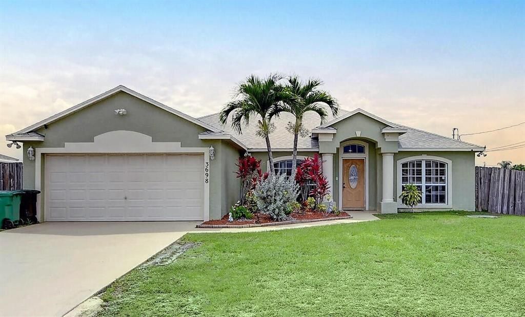 Photo of 3698 SW Hale Street, Port Saint Lucie, FL 34953 (MLS # R10725308)