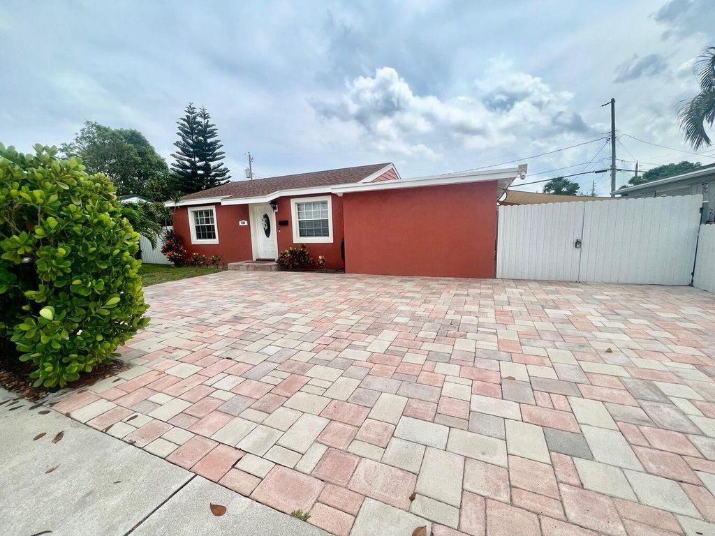 Photo of 620 Monceaux Road, West Palm Beach, FL 33405 (MLS # R11101971)