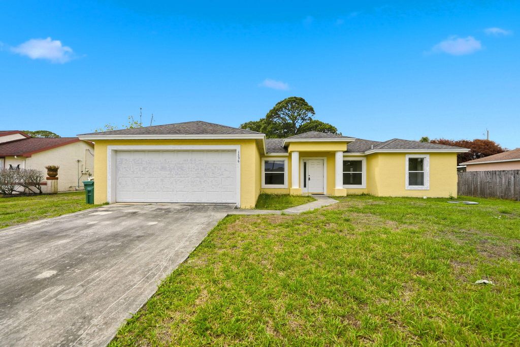 Photo of 1566 SE Sutton Street, Port Saint Lucie, FL 34983 (MLS # B26009214)