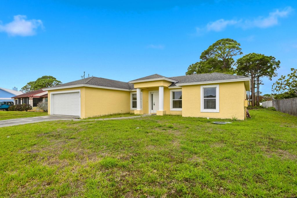 Photo of 1566 SE Sutton Street, Port Saint Lucie, FL 34983 (MLS # B26009214)