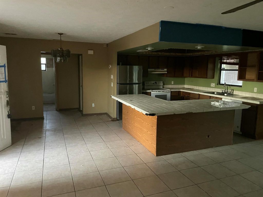 Photo of 765 SE Floresta Drive, Port Saint Lucie, FL 34983 (MLS # R11136183)