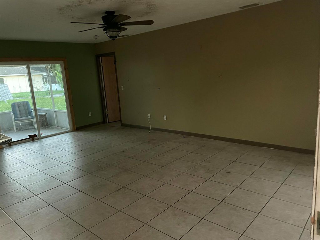 Photo of 765 SE Floresta Drive, Port Saint Lucie, FL 34983 (MLS # R11136183)