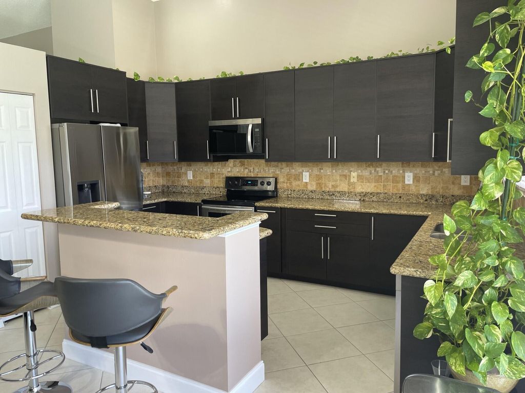 Photo of 9514 Lago Drive, Boynton Beach, FL 33472 (MLS # R11114163)