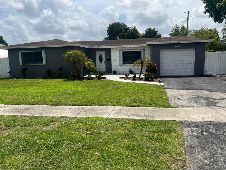 Welcome to this spacious 4-bedroom, 2-bath single-family home in the heart of Lauderhill! Featuring a functional layout with approximately 1,800+ sq ft of living space, this property offers tile and wood flooring throughout the main areas and laminate flooring in the bedrooms. The kitchen is equipped with stainless steel appliances, perfect for everyday living and entertaining. Enjoy a generously sized backyard with fencing, ideal for outdoor gatherings or relaxing in privacy. Conveniently located near major highways, schools, shopping, and dining. Whether you're a homeowner or investor, this property offers great potential and value. The AC is 2024.  This property also has NO HOA!!  Don't miss this opportunity.  This property is Owner-Occupied!