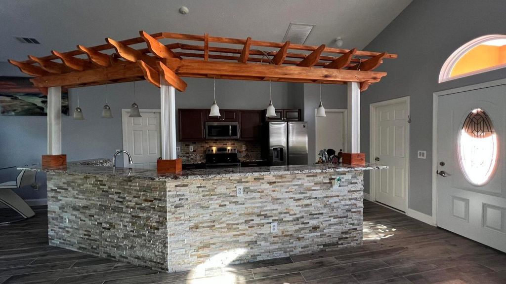 Photo of 4516 NW Alsace Avenue, Port Saint Lucie, FL 34983 (MLS # R10947885)