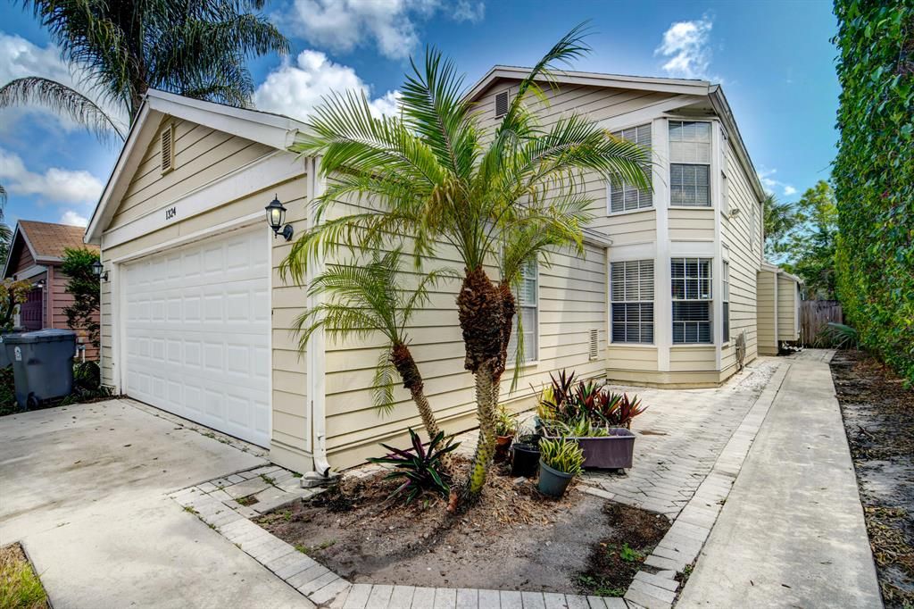 Photo of 1324 Strawberry Lane, West Palm Beach, FL 33415 (MLS # R10745798)
