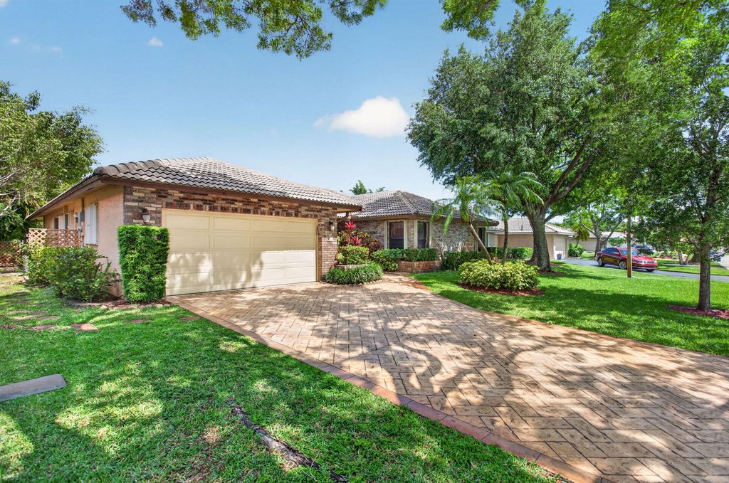 Photo of 1311 NW 111th Way, Coral Springs, FL 33071 (MLS # B26042124)