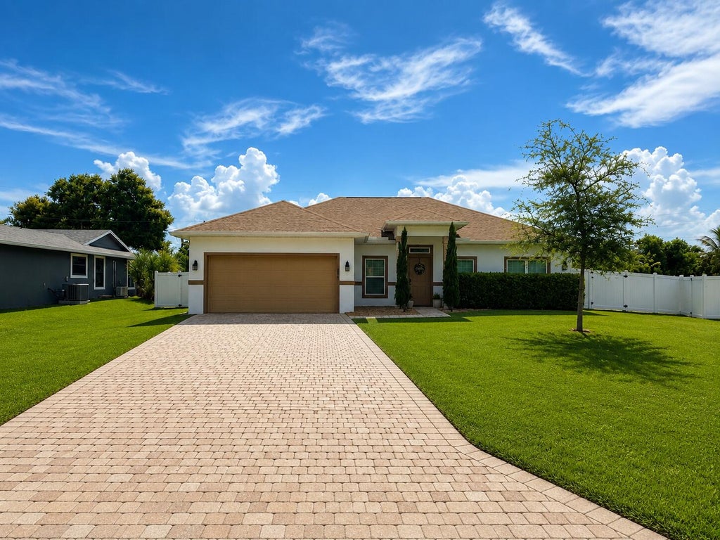 Photo of 1367 SW CHASE Road, Port Saint Lucie, FL 34953 (MLS # B26067952)