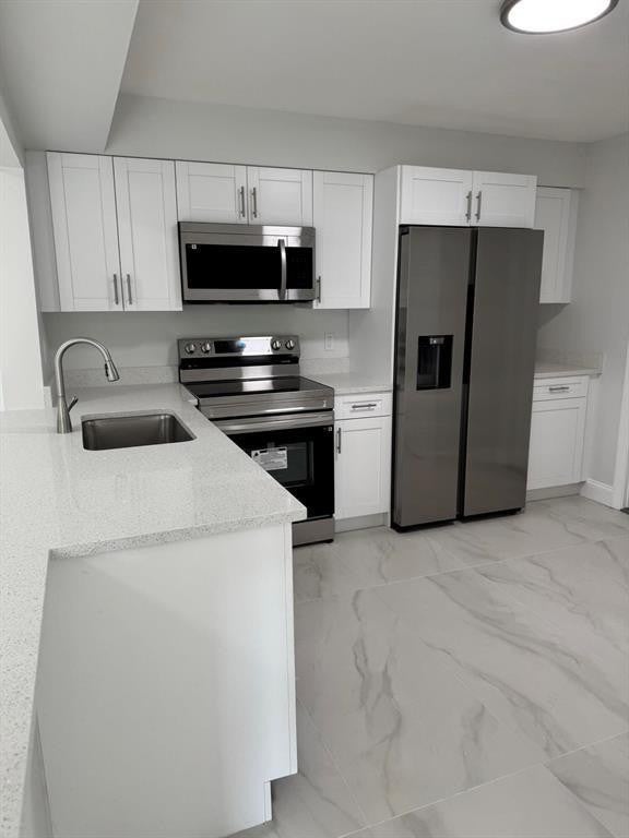 Photo of 4994 NW 6th Court, Delray Beach, FL 33445 (MLS # F10484952)